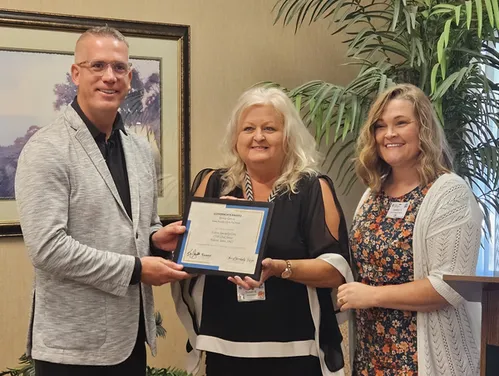 Eldora staff accepting award