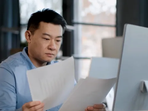 Man reviewing report
